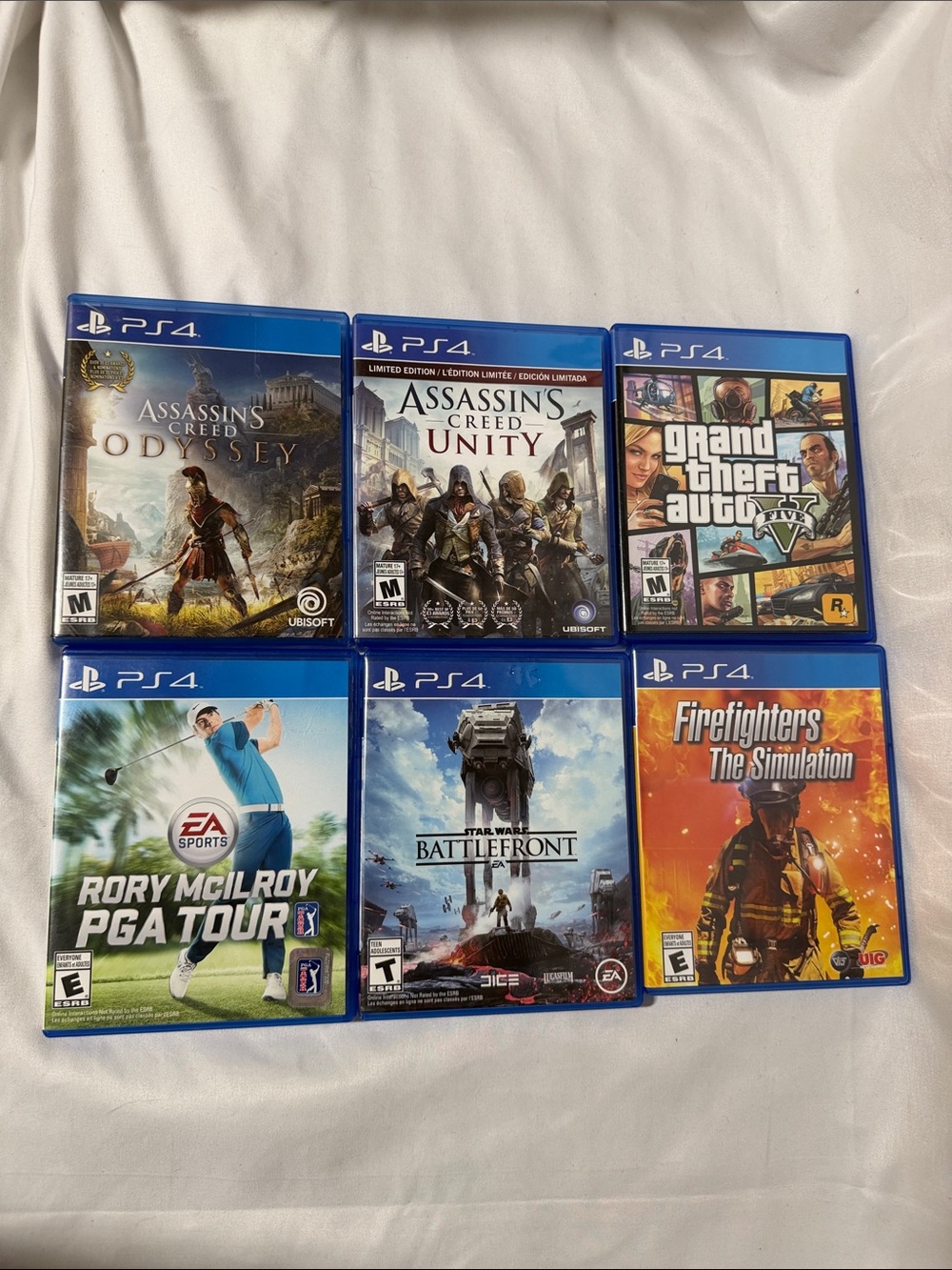 PS4 Video Game Bundle Lot of 6 – GTA V, Assassin’s Creed, Star Wars & More